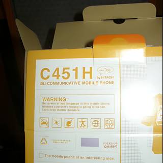 A Box with a Yellow Sticker