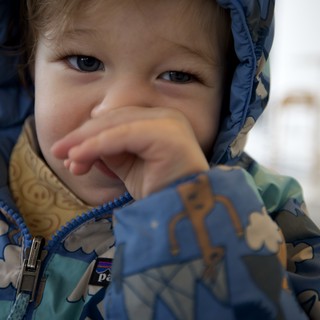 Adorable Toddler in Blue Patterned Winter Hood