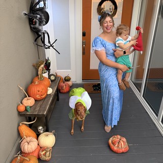 Halloween Porch with Family and Decorated Dog