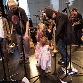Jamming on Stage: A Father-Daughter Duo
