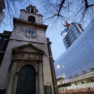 Historic Clock Tower Amid Modern London Development
