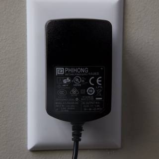 Powering Up: A Black Adapter in Action