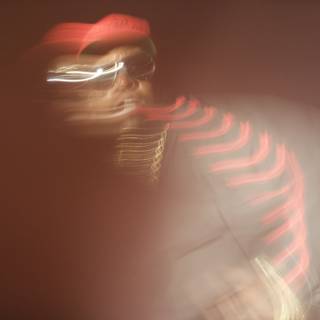 Blurred Portrait of a Man in a Red Hat