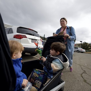 Family Shopping Trip in Parking Lot with Kids