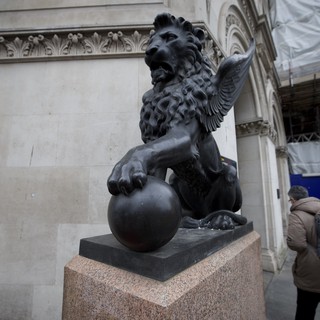 Winged Lion Statue on Granite Pedestal in London