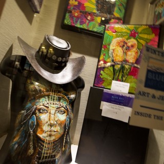 Artistic Display of Native American Inspired Sculptures and Paintings