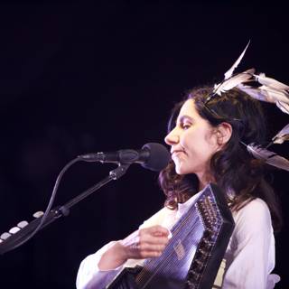 PJ Harvey Rocking a Feathered Look