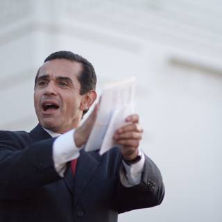 Antonio Villaraigosa Holds a Document