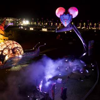 Giant Mouse and Snail Light Up Coachella Night Sky