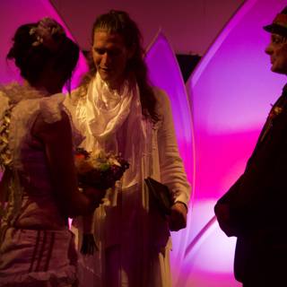 The newlyweds in purple light