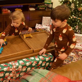 Brothers Opening Christmas Gifts on Christmas Morning