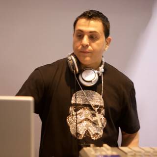 DJ Skribble rocking his Star Wars shirt and headphones