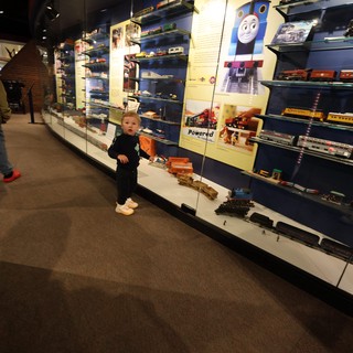 Toddler Exploring Thomas the Tank Engine Train Museum Display