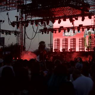 Red Spotlight on an Excited Crowd at a Rock Concert