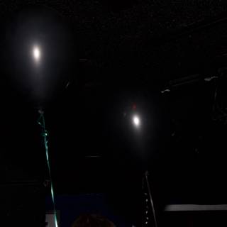 Dark Balloons and Dim Spotlight