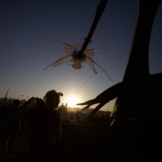 Flying Kite at Sunset