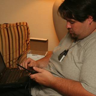 Man on Couch with Laptop