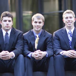 Three Men in Elegant Suits Pose for Flexilis Shoot