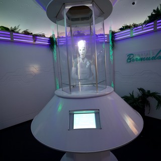Retro-Futuristic Robot Display in Glass Teleportation Chamber