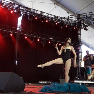 Women in Black Swimsuits Perform on Stage