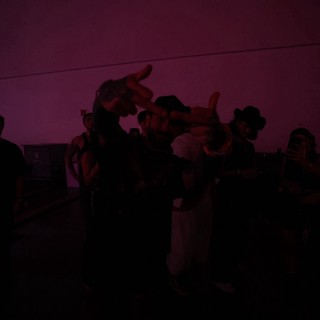 Festival Crowd Energy Under Purple Night Sky