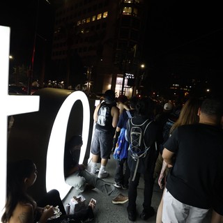 Crowd Gathers Around Glowing Sign at Wobbleland 2026