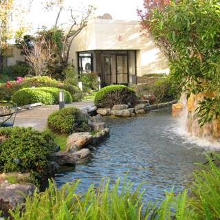 Serene Pond with a Cascading Waterfall in a Natural Garden