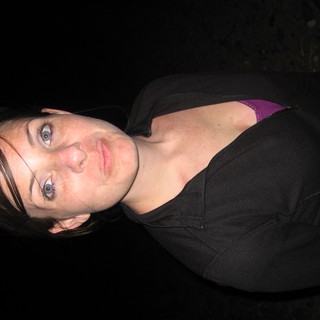 Young Woman Posing Outdoors at Night 2006