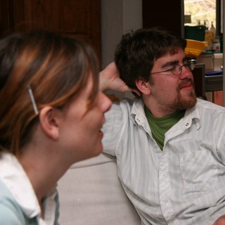 Casual Indoor Conversation Between Two Young Adults