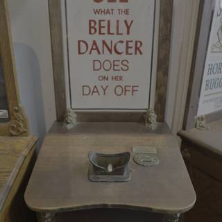 Wooden Desk Sign Featuring a Dancer