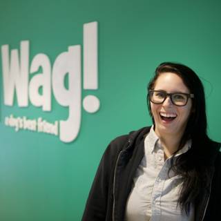 Glasses and Grins at the Wag Logo