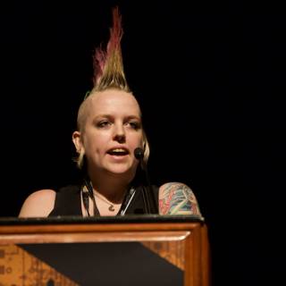 Unapologetically Tattooed: A Mohawked Speaker Captivates the Crowd