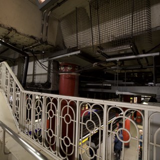 Industrial Underground Station Platform with Ornate Victorian Railings