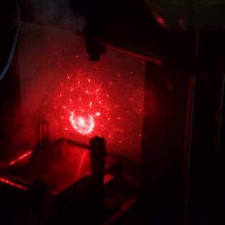 Red Laser Light Through Machine