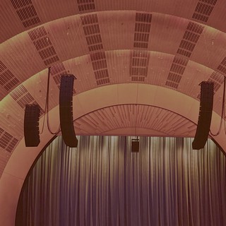 Dramatic Arched Ceiling with Suspended Lighting Elements