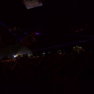 Lights Illuminate the Crowded Concert
