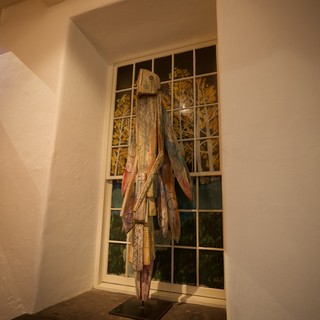 Weathered Folk Art Sculpture in Adobe Gallery Alcove