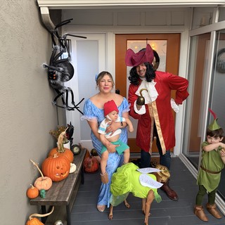 Family Peter Pan Halloween Costume on Front Porch