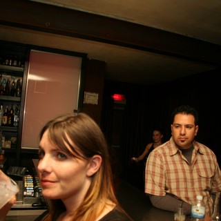 Late Night Bar Scene with Casual Crowd