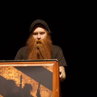 Red Bearded Man Takes the Stage