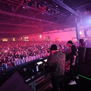 DJ Performs to Massive Indoor Festival Crowd