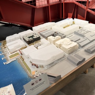 Architectural Model Display in Red Gallery Space