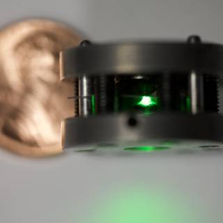 Green Laser Meets Penny