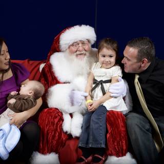 Festive Family Photo with Santa Claus