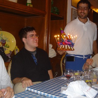Birthday Celebration Surprise at Restaurant Table