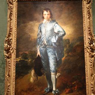 Portrait of a Young Man in Blue Clothes
