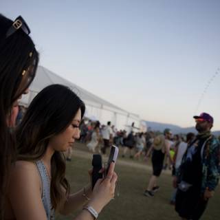 Candid Moments at Coachella 2024: Connected in the Crowd