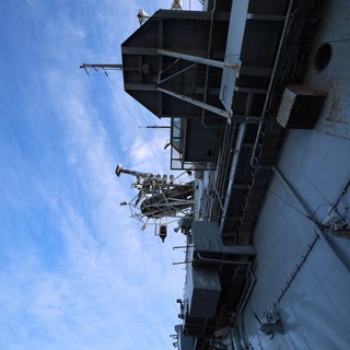 USS Hornet Communications and Radar Mast Against Blue Sky