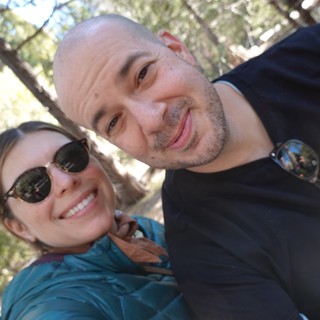 Happy Couple's Sunny Outdoor Selfie Together