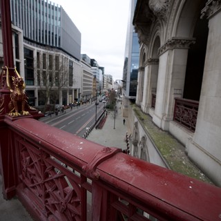 Ornate Red Bridge Overlooking London Street at Dusk